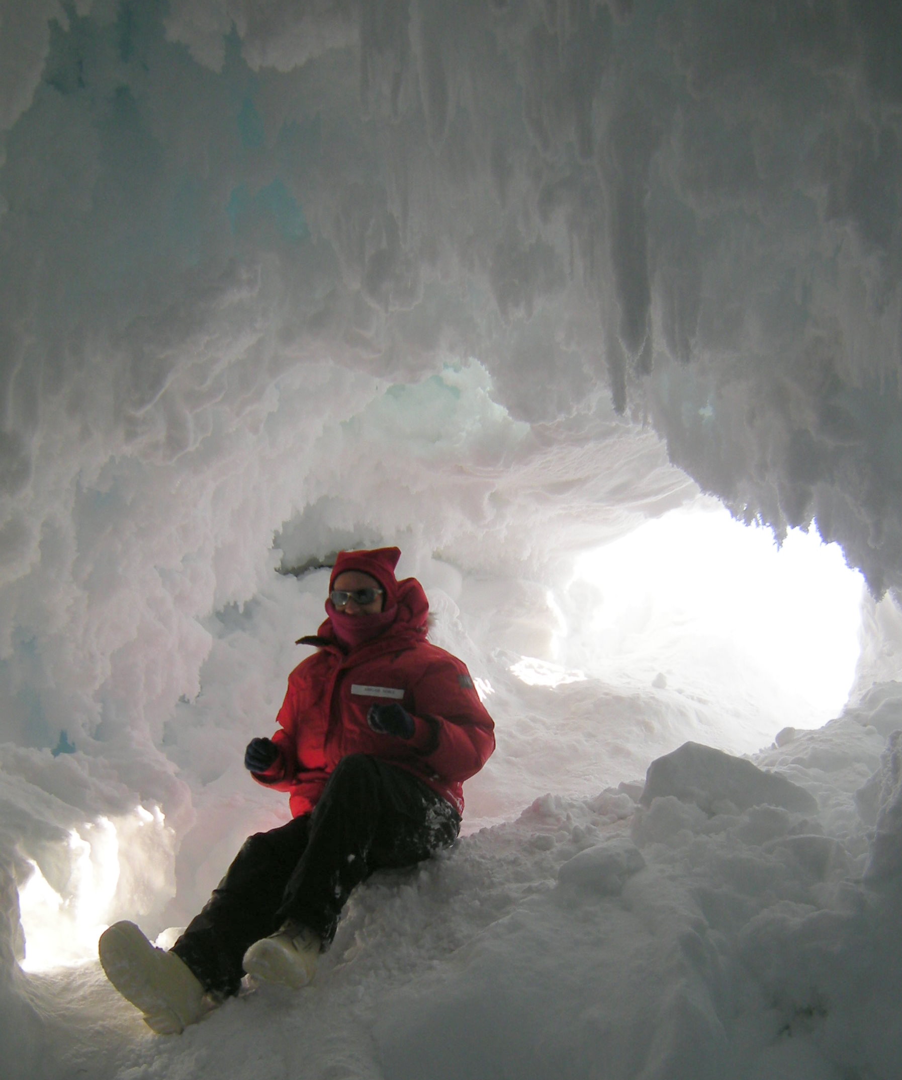 Abigail goes inside the Erebus Glacier through an ice cave