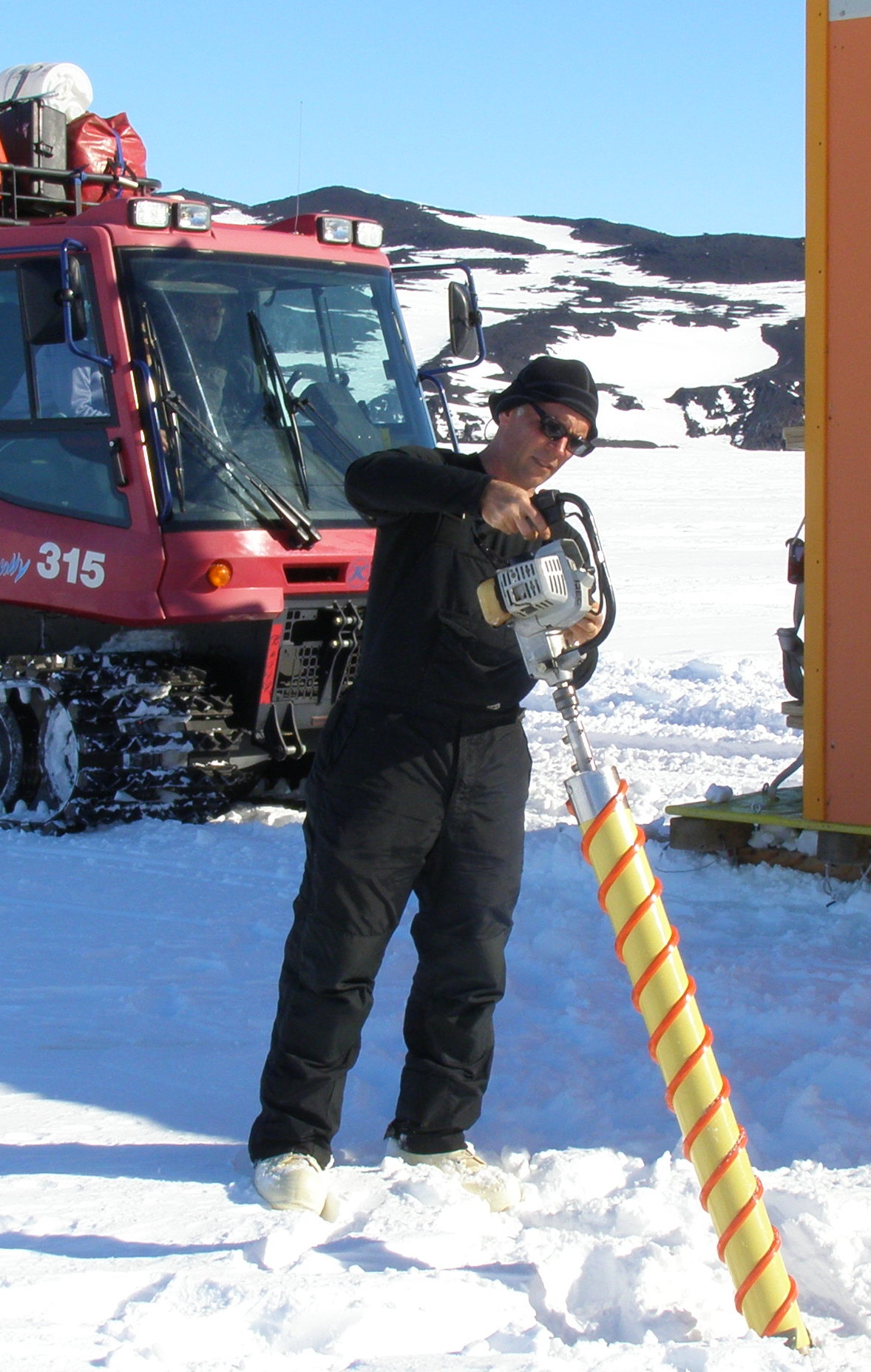 Jeff McQuaid using a Kovacs drill to obtain an ice core