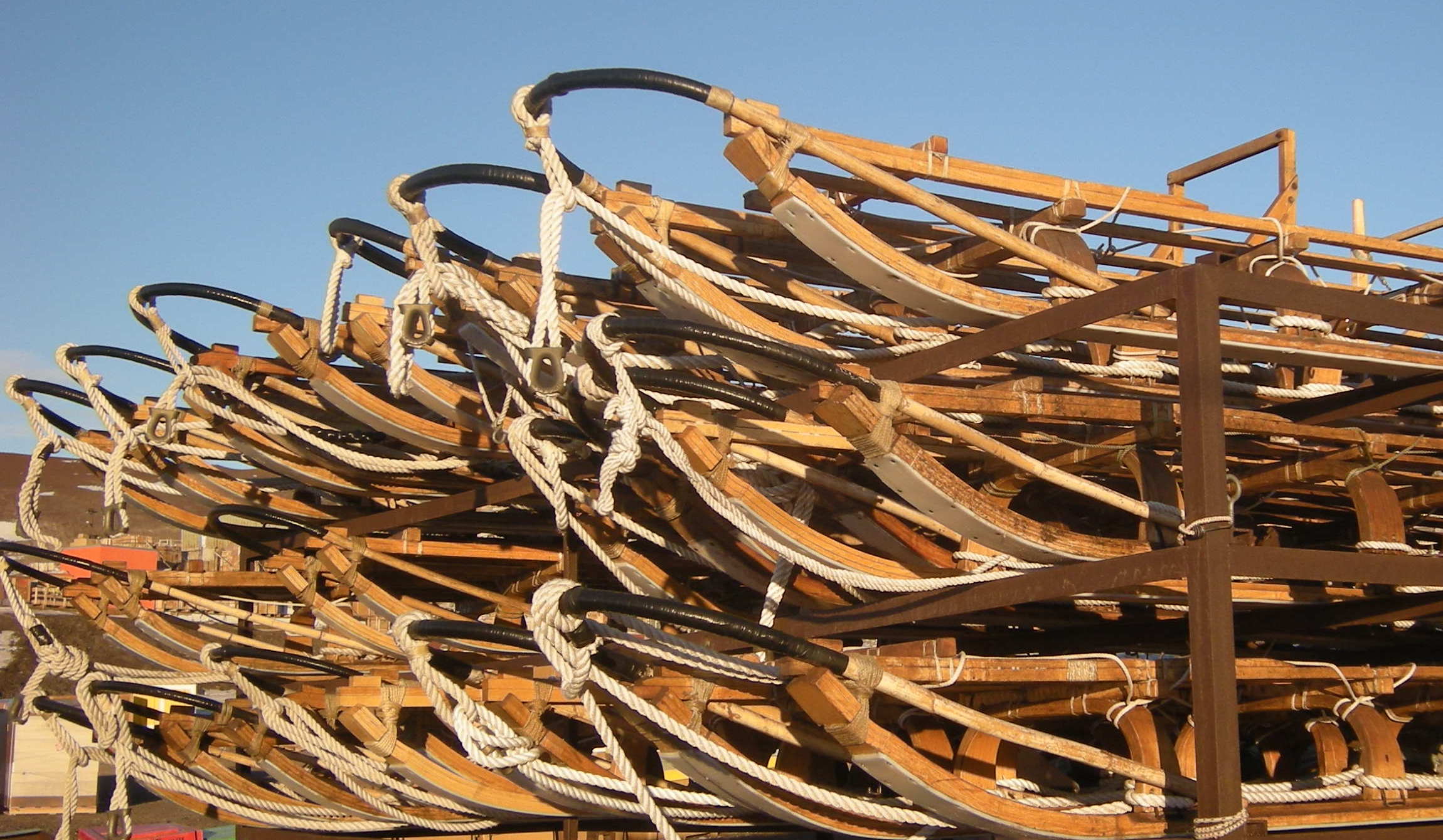 A pile of Nansen sleds next to the Berg Field Center